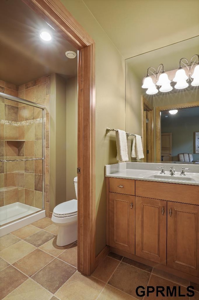 full bath with vanity, toilet, recessed lighting, and a stall shower