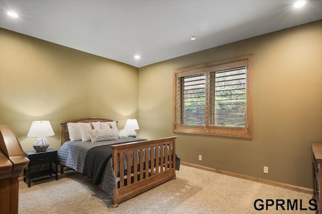 bedroom with carpet floors, recessed lighting, and baseboards