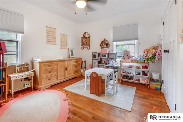 recreation room featuring ceiling fan and wood finished floors