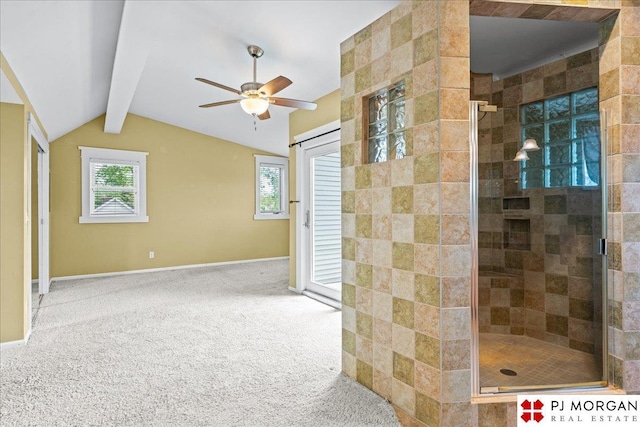 full bathroom with ceiling fan, tiled shower, and baseboards