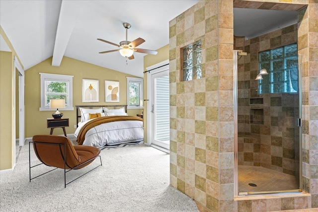 ensuite bathroom featuring a stall shower and ceiling fan