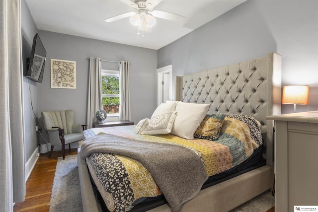 4504 Mayberry St, Omaha, NE 68106 - bedroom featuring a ceiling fan, baseboards, and wood finished floors