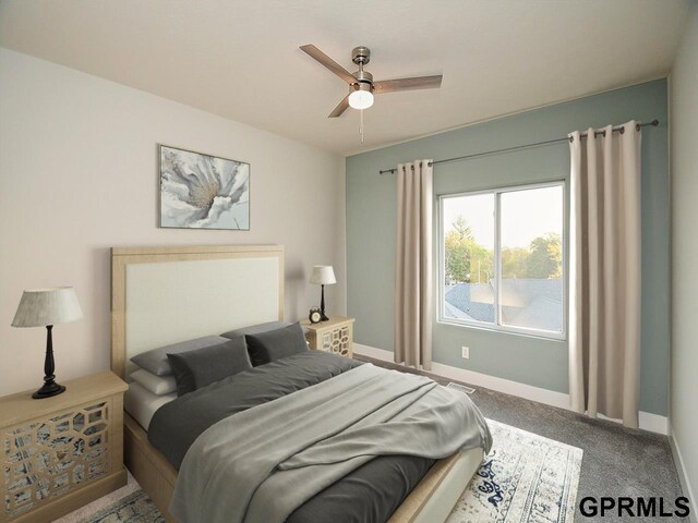 bedroom with baseboards, ceiling fan, and carpet flooring