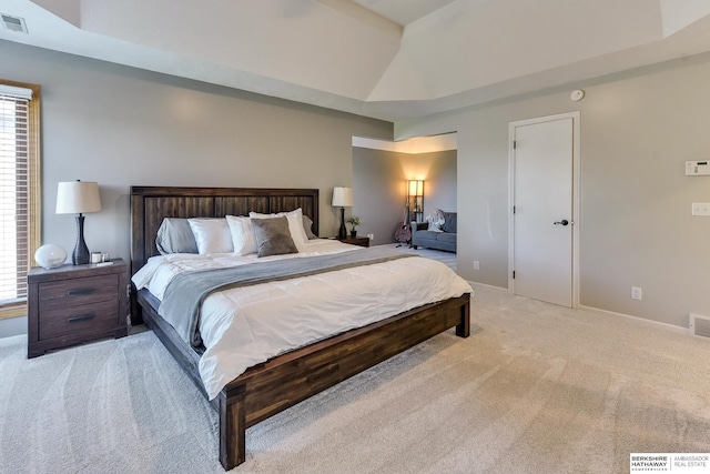 bedroom with carpet floors, multiple windows, baseboards, and visible vents