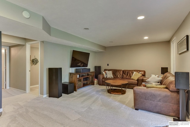 living room with baseboards, carpet flooring, and recessed lighting