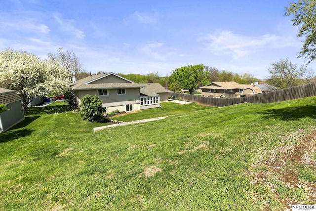 view of yard with fence