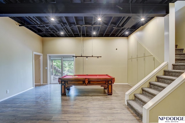 recreation room with baseboards, wood finished floors, and pool table