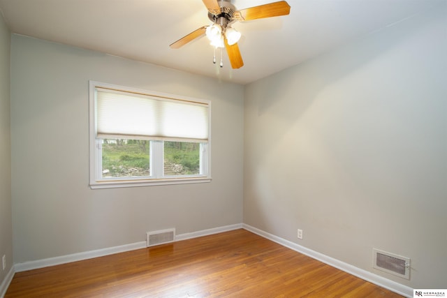 8514 Pinkney St, Omaha, NE 68134 - spare room with visible vents, a ceiling fan, baseboards, and wood finished floors