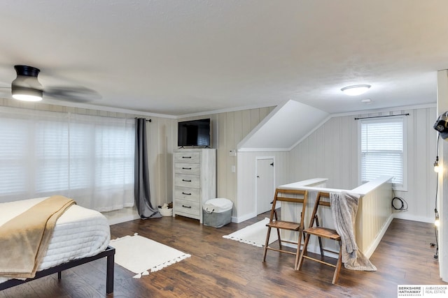 bedroom featuring baseboards, dark wood-style floors, and visible vents