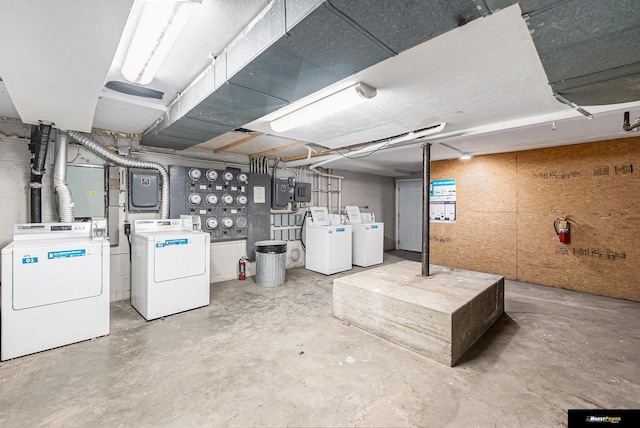 unfinished below grade area with washing machine and dryer