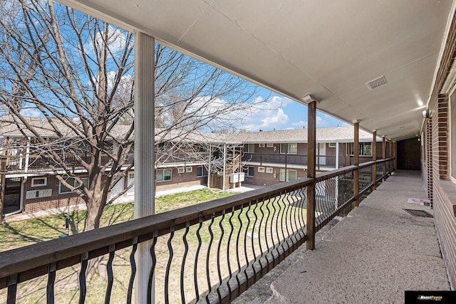 balcony with a residential view and visible vents