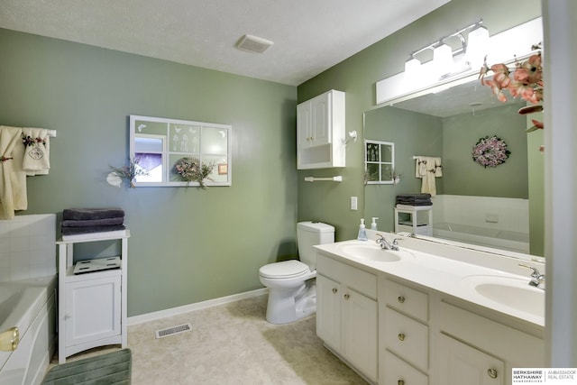bathroom featuring visible vents, a sink, a bath, and toilet
