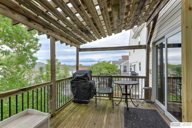 deck featuring a grill