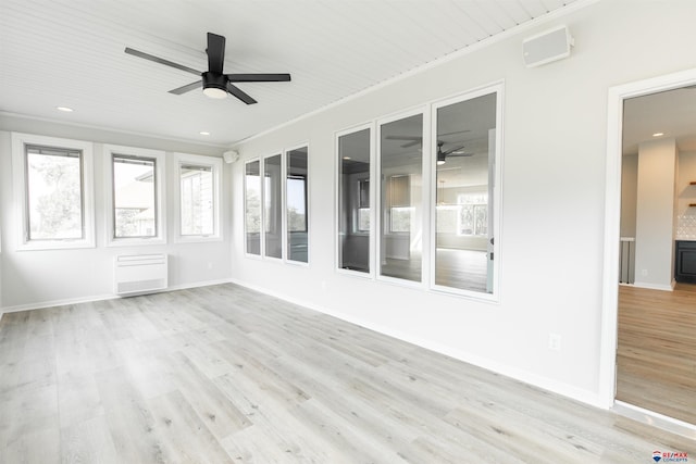unfurnished sunroom featuring a healthy amount of sunlight