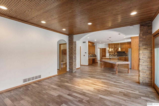 11380 24th Ave, Plattsmouth, NE 68048 - living area with wood ceiling, decorative columns, recessed lighting, and visible vents