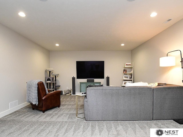 living room with recessed lighting, carpet flooring, baseboards, and visible vents