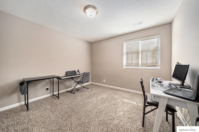 carpeted office space featuring a textured ceiling, baseboards, and visible vents