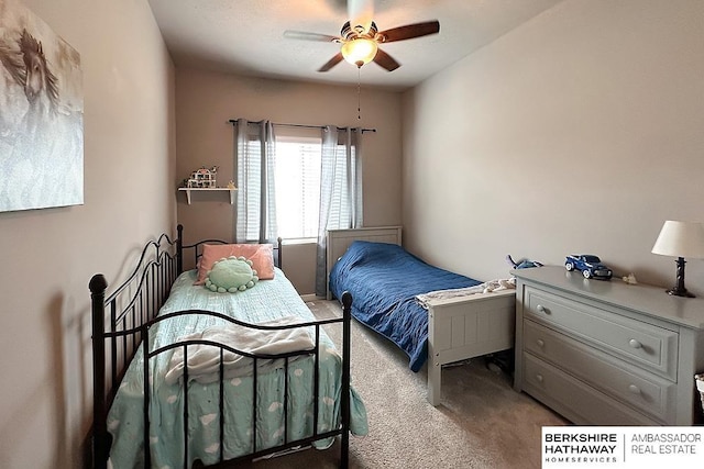 bedroom with carpet flooring and ceiling fan