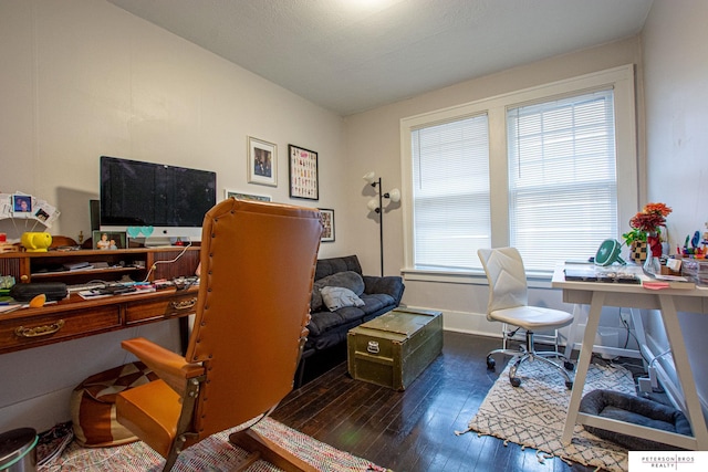 office space with baseboards and hardwood / wood-style floors