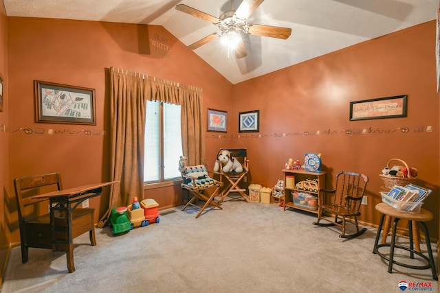 game room featuring carpet floors, baseboards, ceiling fan, and lofted ceiling