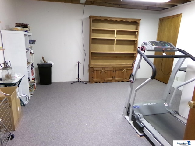 workout area with light colored carpet