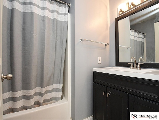 bathroom with a shower with curtain and vanity