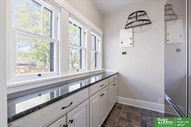 interior space with baseboards