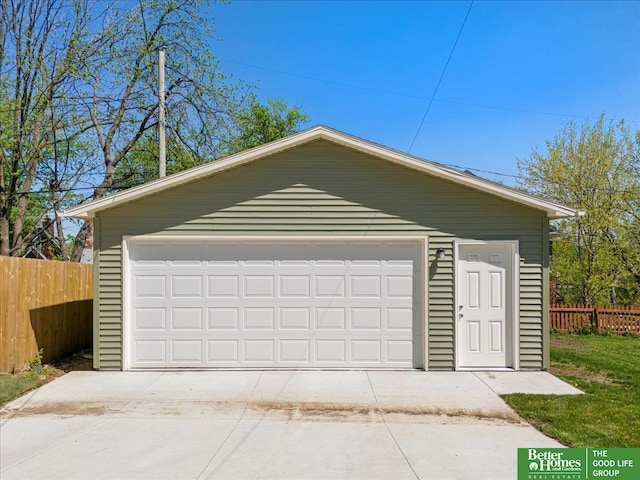 detached garage with fence