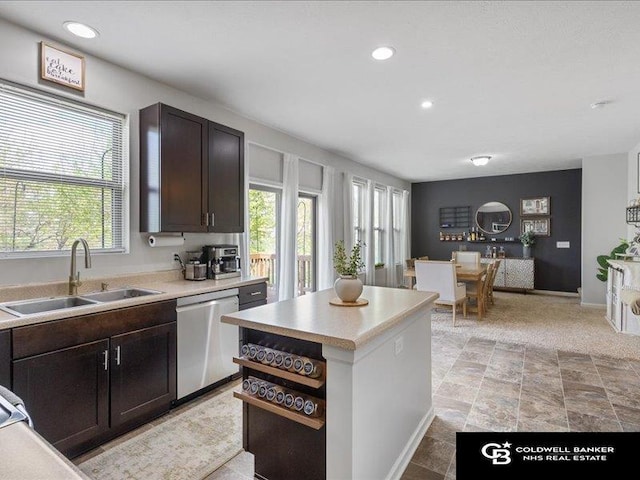 kitchen with recessed lighting, a sink, dishwasher, and a healthy amount of sunlight