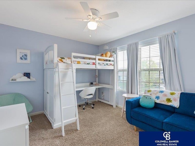 bedroom with baseboards, a ceiling fan, and light carpet