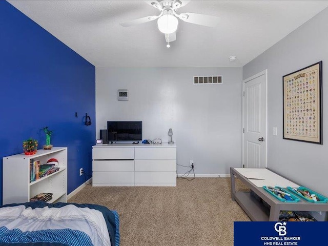 bedroom with carpet floors, baseboards, a ceiling fan, and visible vents