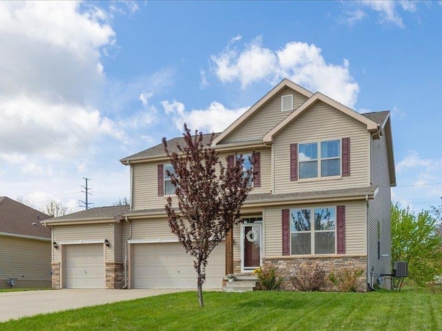 craftsman-style home featuring a garage, a front lawn, stone siding, concrete driveway, and an attached garage