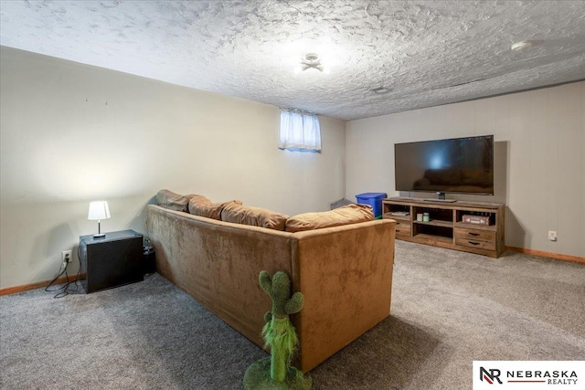 living room with baseboards, carpet flooring, and a textured ceiling
