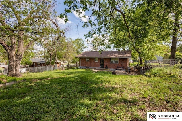 view of yard featuring a fenced backyard and a patio area