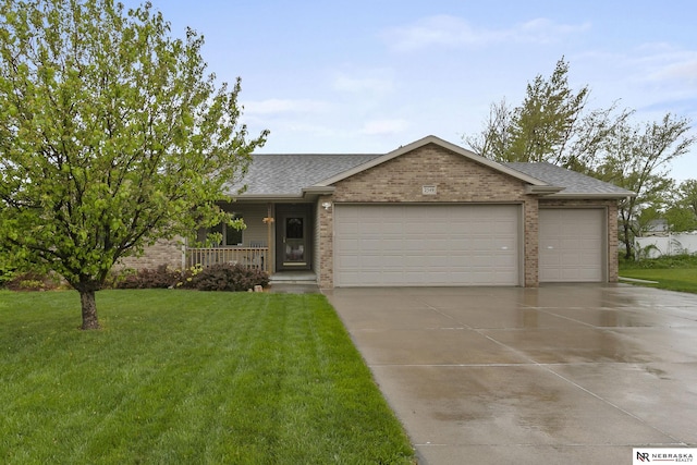 ranch-style house with concrete driveway, brick siding, a front lawn, and a garage