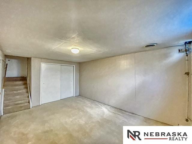 unfurnished bedroom featuring visible vents and a closet