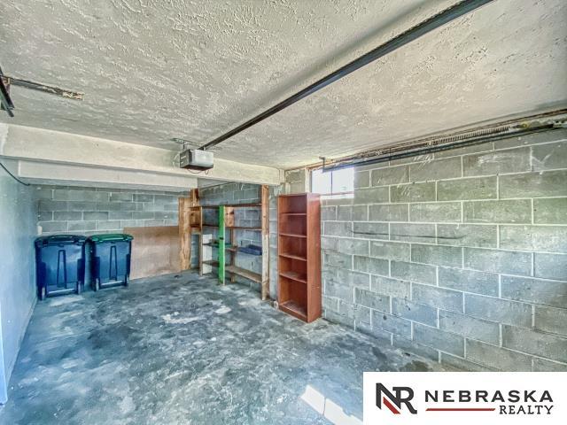 interior space with a textured ceiling