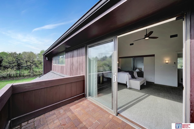 balcony with a ceiling fan