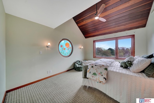 carpeted bedroom featuring baseboards, a ceiling fan, and lofted ceiling