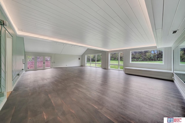 unfurnished sunroom with french doors and a healthy amount of sunlight