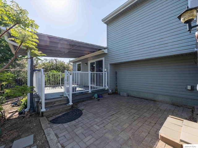 view of patio with a wooden deck