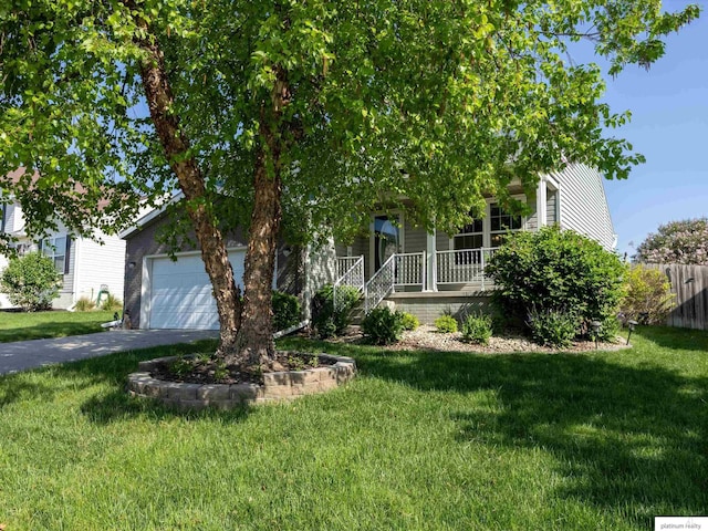 obstructed view of property with driveway, a garage, and covered porch