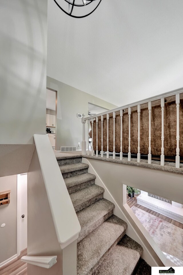 stairs featuring visible vents