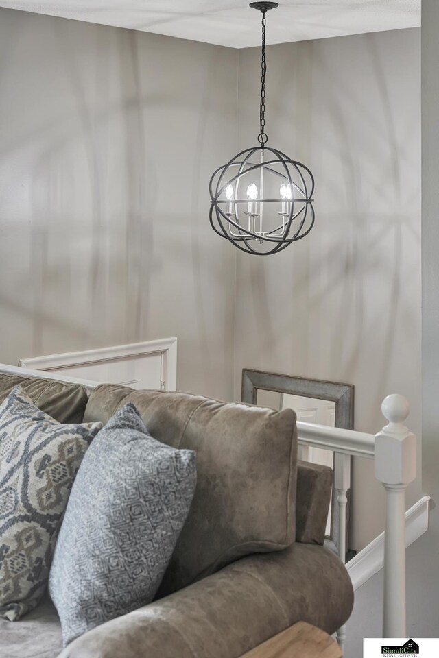 living area with a chandelier