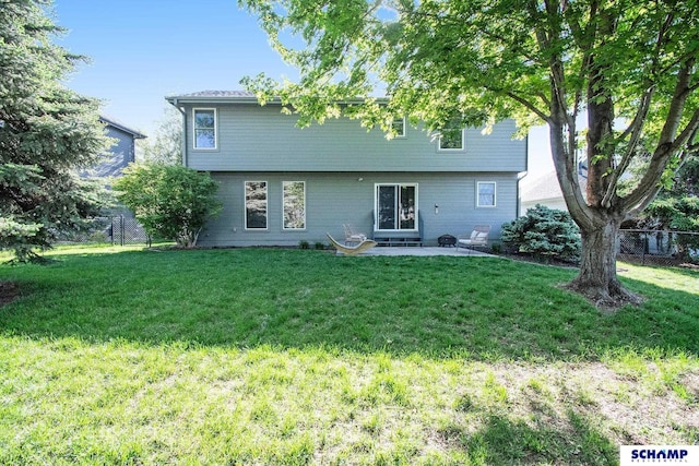 rear view of house featuring a patio area