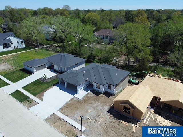 bird's eye view with a residential view and a forest view