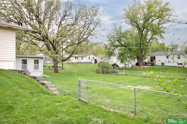 view of yard featuring fence