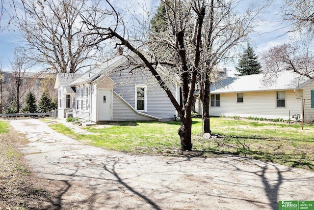 exterior space featuring a lawn