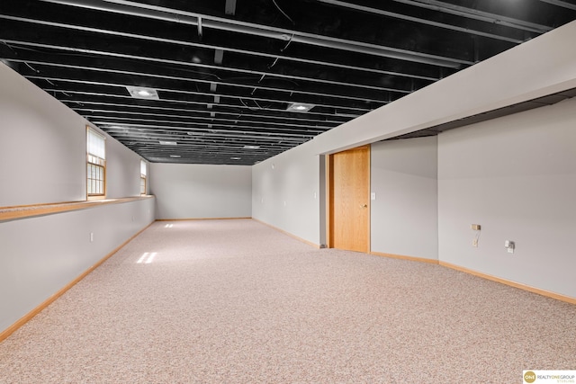 554 Shawnee Blvd, Tecumseh, NE 68450 - below grade area with carpet floors and baseboards