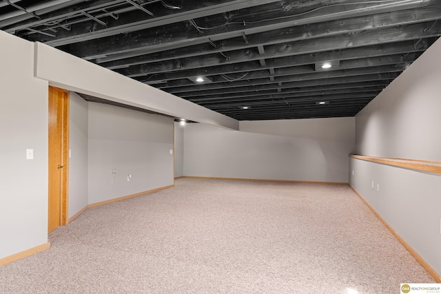 554 Shawnee Blvd, Tecumseh, NE 68450 - finished basement featuring carpet floors and baseboards